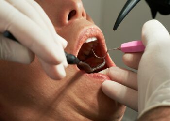 What Is The Recommended Frequency For Adults To Undergo Dental Check-Ups And Cleanings?