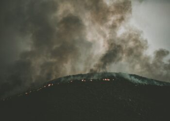 Rapidly Advancing Wildfires Threaten Western Communities