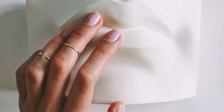 What Is The Medical Term For The White Crescent At The Nail Base?